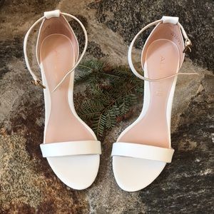 White leather stilettos